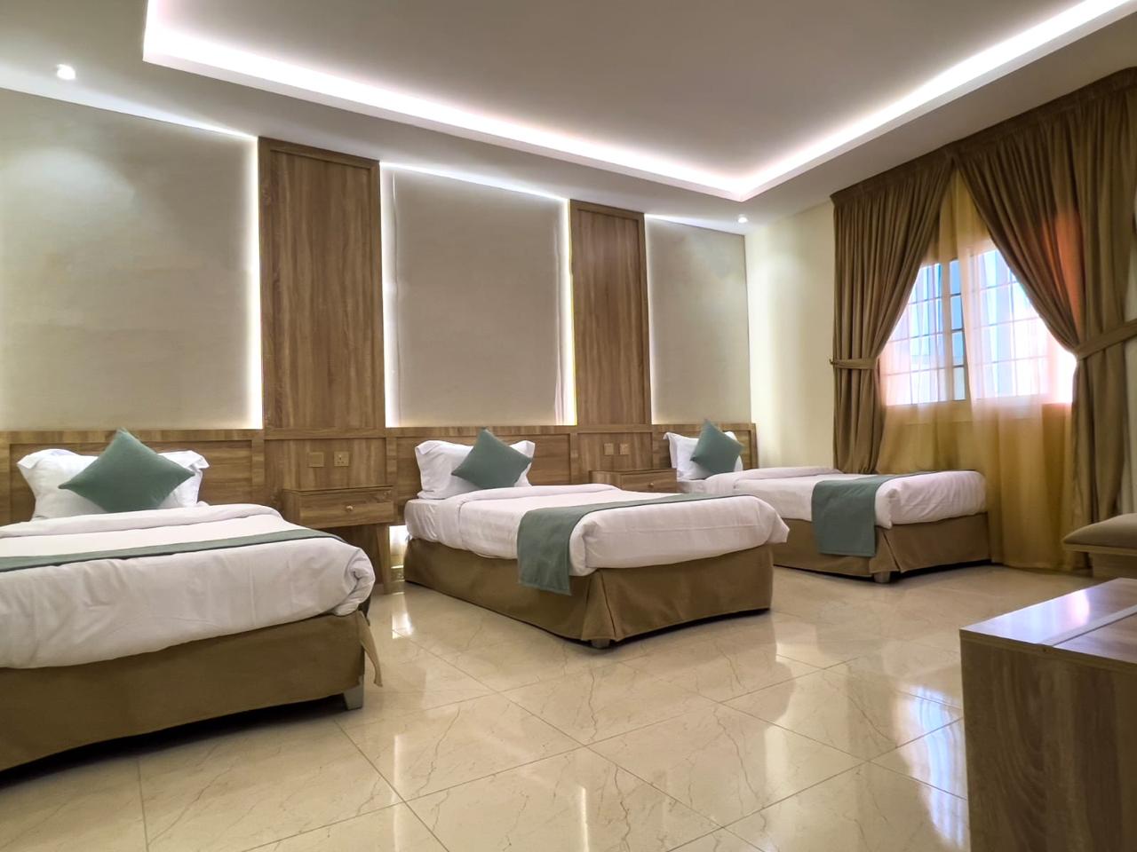 Chambre spacieuse — 3 lits